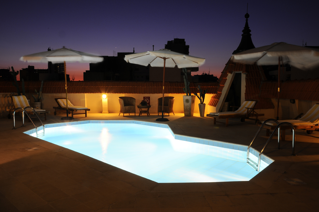 Serenada rooftop pool at sunset